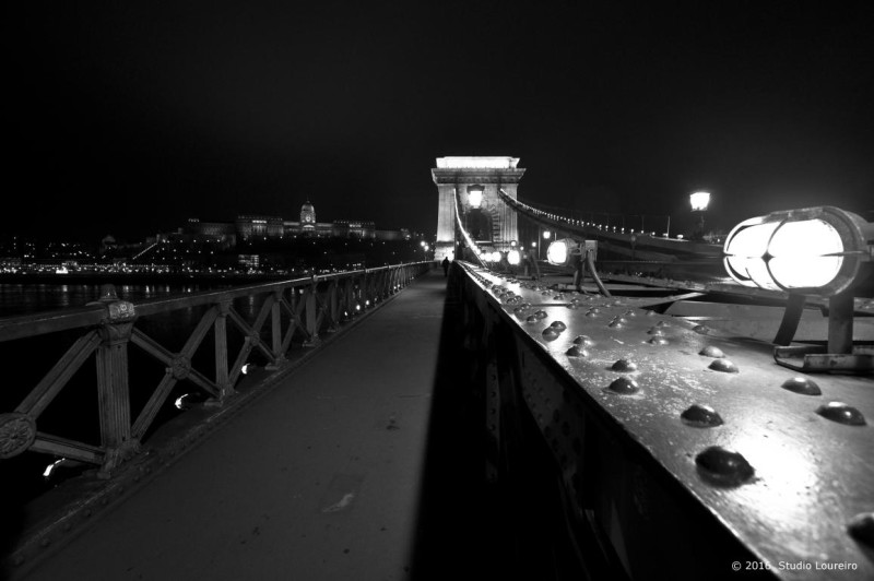 The bridges of Budapest are simply wonderful, a beautiful work of architecture. It’s impossible not to be mesmerized by it. So to say, The Chain Bridge (Széchenyi lánchíd) over the Danube is one of the most famous images of Budapest, not to say an icon of Hungary. This bridge between Pest and Buda offers the spectacular view of the city. On the Pest side, the pointed towers of the Parliament Building cut the Danube, while the Buda Castle stands on the other side.