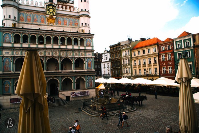In the center of Poznan, you will find the Old Market Square. Called Stary Rinek in polish, this is the center of the city. There you will find the historical Town Hall, a row of of merchants houses, the former town chancellery and the old weighing house. Take a walk around the square and you will be able to see everything but play more attention to the tallest building there. You can thank me later.