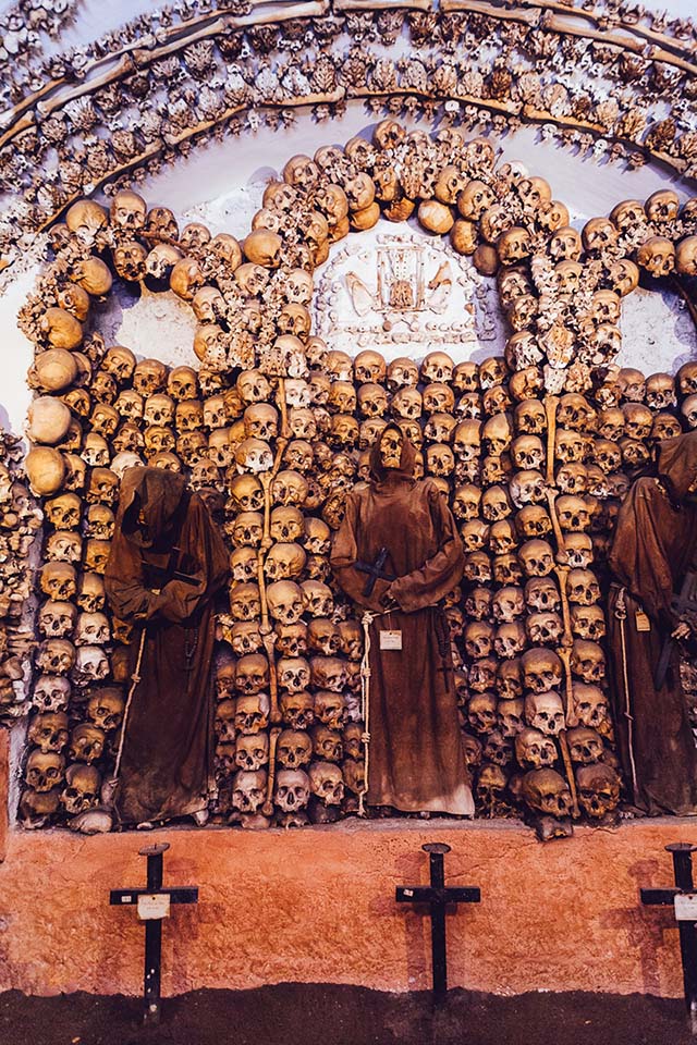 One of the most bizarre and beautiful places to visit in Rome is the Capuchin Crypt. This catacomb and museum is a small area located underneath the little church of Santa Maria della Concezione dei Cappuccini. Hidden in one of Rome’s major piazzas, the Piazza Barberini on the Via Veneto, this tiny space underneath a church is home to the remains of no less than 4,000 Capuchin monks, brought here in 300 carts when the monks moved in. All the bones are displayed in a beautiful way - for some people I might add - over the walls and ceiling.