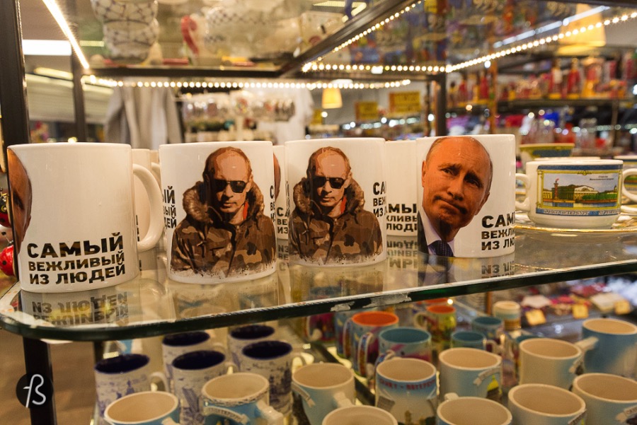In Russia, the souvenir is Putin Funny and scary at the same time =D Can somebody please translate what those mugs and t-shirts say?