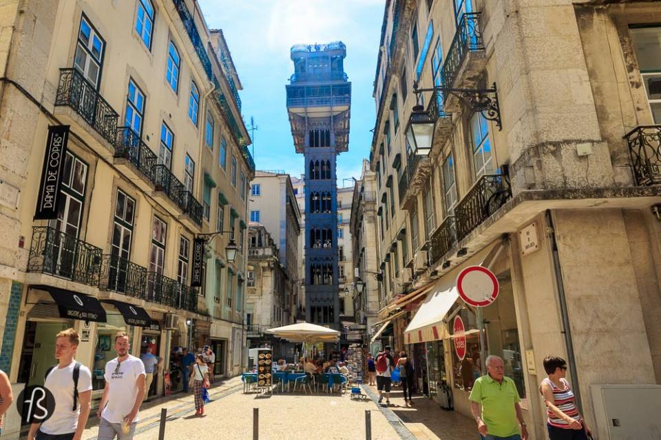 things to do in lisbon - The majestestic Elevador de Santa Justa If you're walking around Baixa, you'll see this gigantic piece of architecture for sure. From it you'll have one of the best views of Lisbon's old town. It was built more than 100 years ago by Ponsard, one of the disciples of the great Gustave Eiffel. Yes, Eiffel from the Eiffel Tower in Paris. This lift follows the same style as the iconic parisian tower and it is just wonderful. Connecting the streets of Baixa with the Largo do Carmo, the Elevador de Santa Justa - or just Carmo Lift - is a must.