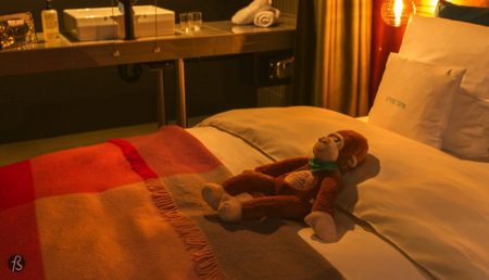 The bed was perfect for my taste, and a plush monkey was laying there when I got to the hotel. Like it was protecting my bed from whoever might have come before me. There was also a surprise for me with a small bottle of KR/23 liquor and a small bag filled toiletries.