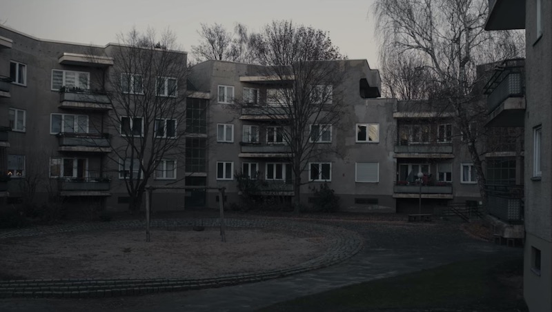 After rewatching a few dark episodes before the third season was released, I wondered about where Tronte and Jana Nielsen live in 2019. In the series, whenever the couple appears in the past, they still live where Ulrich Nielsen lived with his family in 2019. But, whenever the show goes into the present, the year 2019, they live in a gray block of buildings.  These buildings looked familiar to me. I have been cycling around Berlin for a long time, and, from time to time, I recognize places and locations that I might have seen before. 