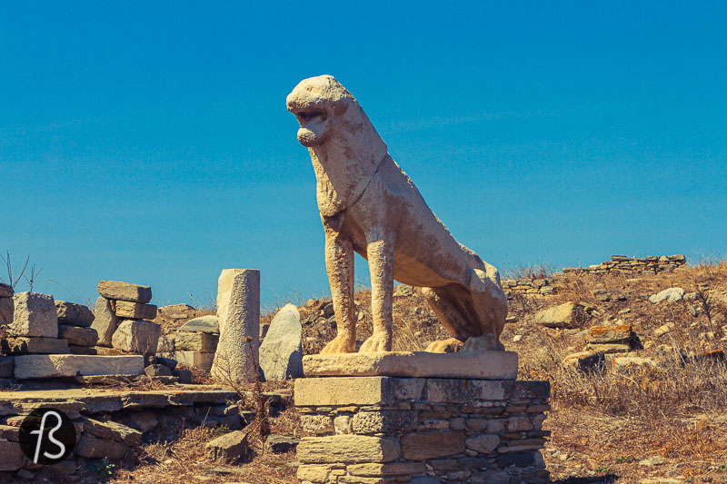 Across from the dry lake, you can find the Terrace of the Lions, where, initially, 12 stone lions were celebrating Apollo. Built around 600 BC, the lions face the Sacred Lake of Delos, and they were placed in a position to guard the lake, somehow.
